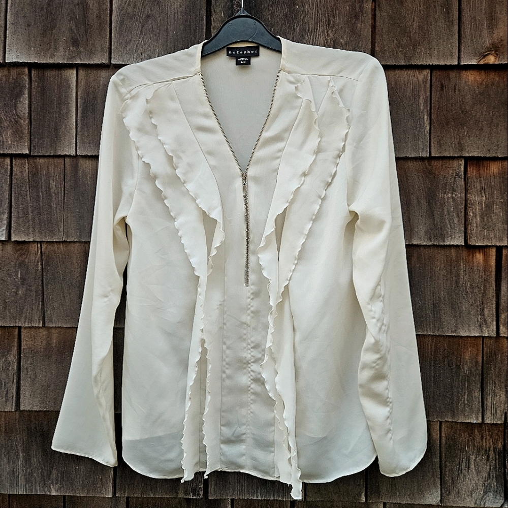 Small, white, ruffled blouse